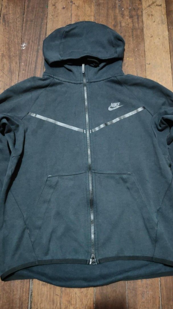 Nike Tech Fleece Full Zip Hoodie (Category: Coats, Jackets and Outerwear) located in Quezon City. Submitted by jthriftshop2022 (Listing ID 1445431843, Image 1). Description: - Classic Nike Tech Fleece hoodie - Full zip closure - Signature chevron design - Comfortable and stylish for everyday wear - Great for layering - Dimes 21-21.5*28.
