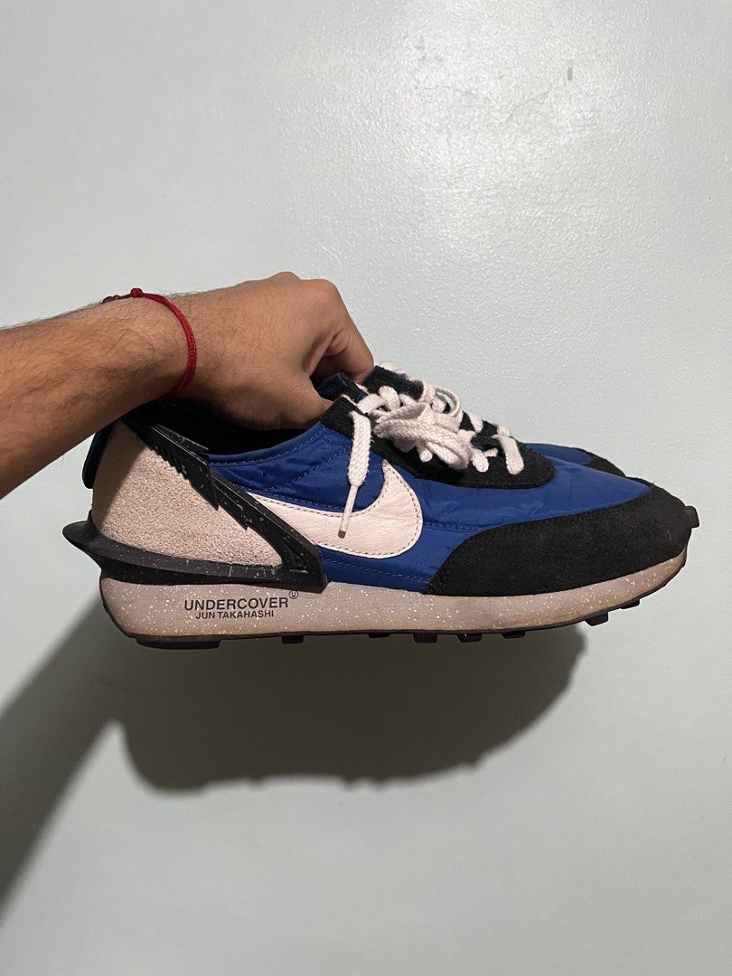 Nike x Undercover Daybreak Blue Black (Category: Sneakers) located in Quezon City. Submitted by _earlb (Listing ID 1445435584, Image 1). Description: - Nike Daybreak x Undercover collaboration - Blue nylon and black suede upper - White Nike swoosh - Chunky heel with "UNDERCOVER JUN TAKAHASHI" text - Speckled midsole - Waffle outsole for grip - Perfect for everyday casual style 8/10 condition Original No box.
