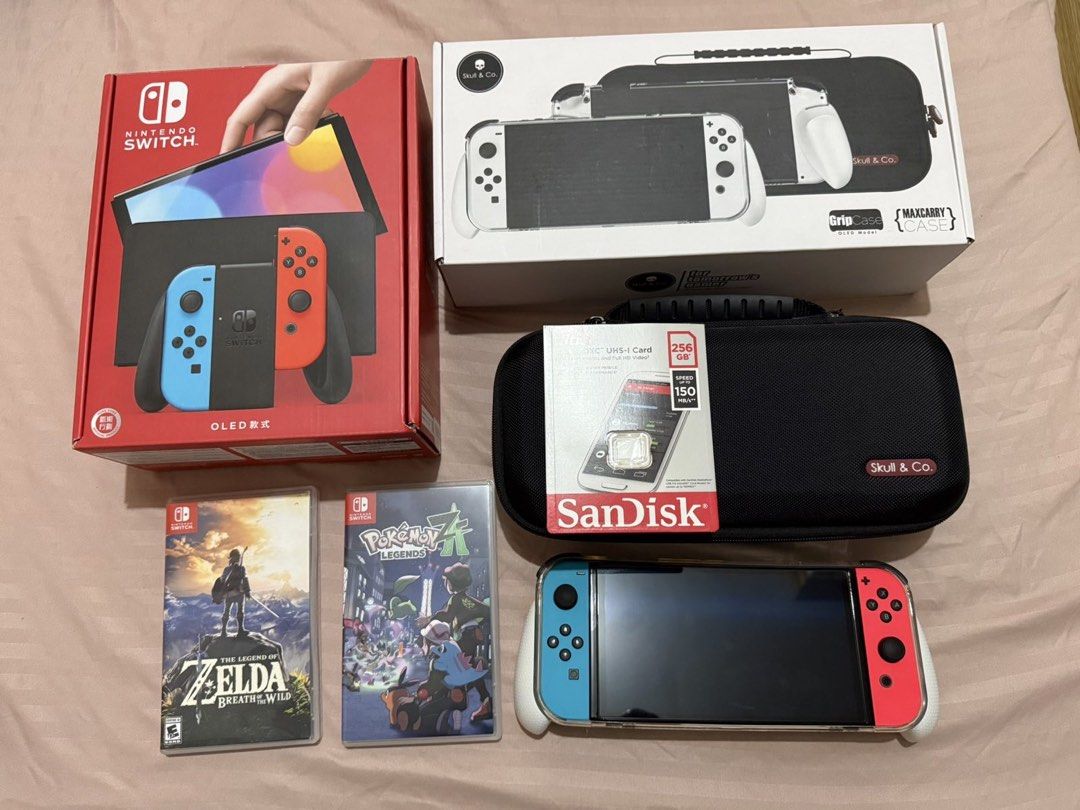 Nintendo Switch OLED Console Bundle with Games & Accessories (Category: Nintendo) located in Las Pinas. Submitted by vinccid (Listing ID 1445440475, Image 1). Description: Nintendo Switch OLED Bundle for Sale – Excellent Condition 🎮 ✨ Lady-owned | Purchased November 2025 | Lightly Used Selling my Nintendo Switch OLED in excellent condition. The unit is rarely used (estimated less than 50 hours total playtime) and has been kept in pristine condit