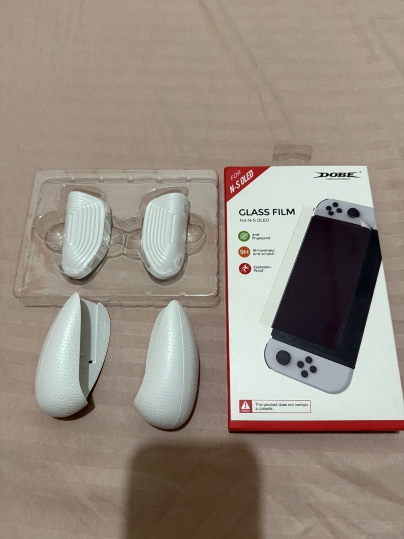 Nintendo Switch OLED Console Bundle with Games & Accessories (Category: Nintendo) located in Las Pinas. Submitted by vinccid (Listing ID 1445440475, Image 3). Description: Nintendo Switch OLED Bundle for Sale – Excellent Condition 🎮 ✨ Lady-owned | Purchased November 2025 | Lightly Used Selling my Nintendo Switch OLED in excellent condition. The unit is rarely used (estimated less than 50 hours total playtime) and has been kept in pristine condit