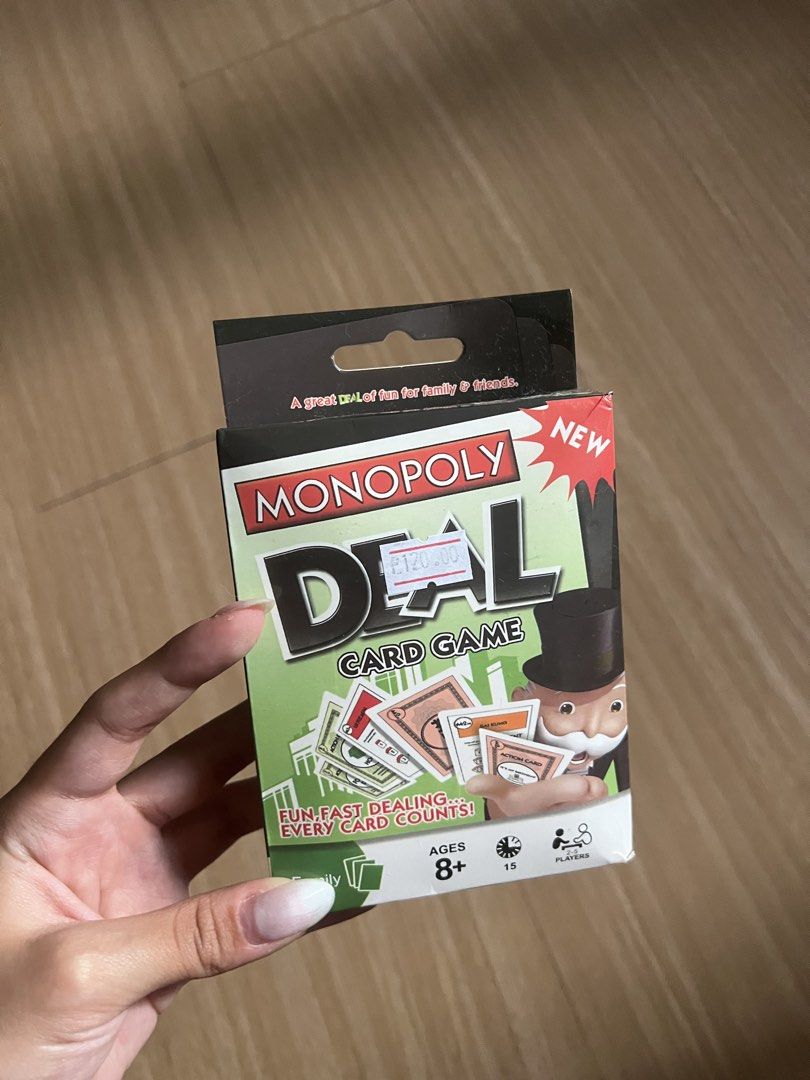 Official Monopoly Deal Card Game (Category: Board Games & Puzzles) located in Makati City. Submitted by nat____ (Listing ID 1445517120, Image 1). Description: - Suitable for ages 8 and up - Play with 2 to 5 players - Includes 108 playing cards - Great for family and friends.