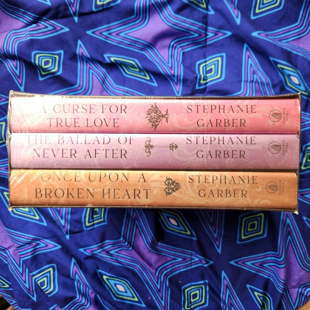 Once Upon a Broken Heart Box Set by Stephanie Garber (Category: Storybooks) located in Manila. Submitted by ShesTine (Listing ID 1445537956, Image 2). Description: - Author: Stephanie Garber - Edition: HARDCOVER - Cover: Stunning starry night design with ornate details - Genre: Fantasy - Ideal for: Fans of fairy tales and magic.