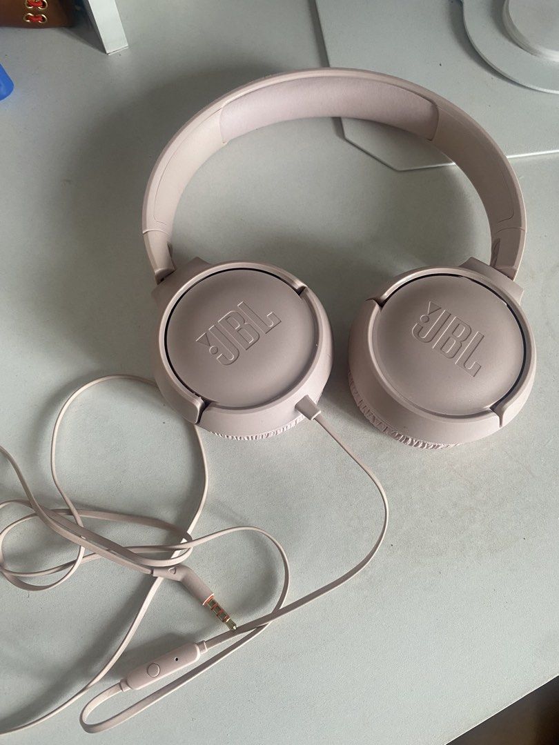 Pink JBL On-Ear Headphones (Category: Headphones & Headsets) located in Manila. Submitted by liyisn (Listing ID 1445453755, Image 1). Description: - Pink JBL on-ear headphones - Wired with 3.5mm jack - Built-in in-line microphone - Integrated volume control - Comfortable earcups and headband - Perfect for listening to music or taking calls - no box.