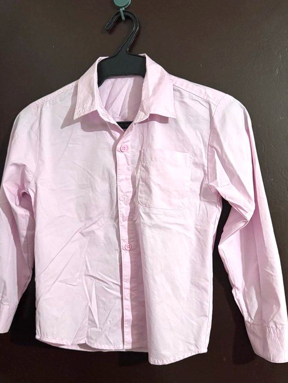 Pink Long Sleeve Button Up Shirt (Category: Babies & Kids Fashion) located in Cainta. Submitted by ZPeyyy (Listing ID 1445533587, Image 1). Description: - Light pink long sleeve shirt - Button-up front - Chest pocket - Classic button-down collar - Ideal for school uniforms or smart casual outfits - Twice lang po nagamit.
