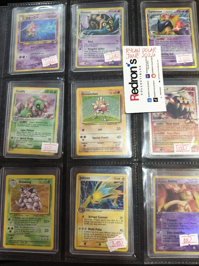 Pokemon Cards For Sale Assorted in Toploader Binder (Category: Raw Singles) located in Manila. Submitted by redron.dolarrylan (Listing ID 1445605662, Image 1). Description: - Collection of Pokemon cards for sale. - Some cards are holographic, adding rarity and value. - Prices are clearly marked on each card in the provided photos. - Ideal for both dedicated collectors and active players. - Feel free to ask any questions about specific cards. - Do