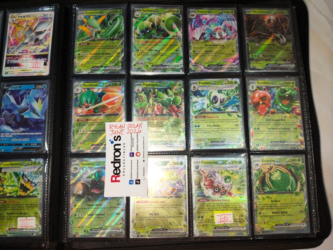 Pokemon Cards Modern Binder Part 2 (Category: Raw Singles) located in Manila. Submitted by redron.dolarrylan (Listing ID 1445605924, Image 2). Description: - Collection of Pokemon TCG cards for sale. - Many holographic and full art cards included. - All cards are kept safely in a binder. - Prices are marked on some cards. - Perfect for collectors! - Feel free to message for more details or specific card photos..