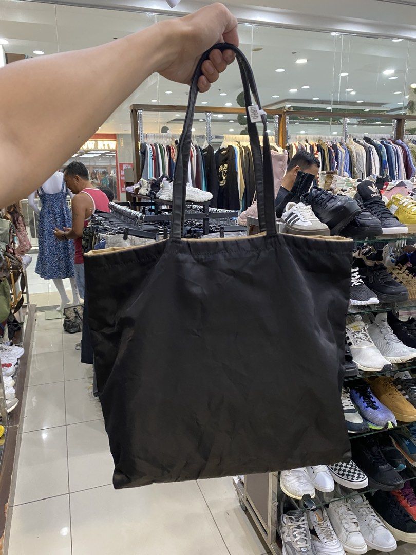 Prada Tessuto Nylon Tote Bag (Category: Luxury Bags & Wallets) located in Legazpi City. Submitted by folksfave (Listing ID 1445427874, Image 2). Description: Rank AB Working zip 9/10 color rate Canvas and leather material are in good Presentable .