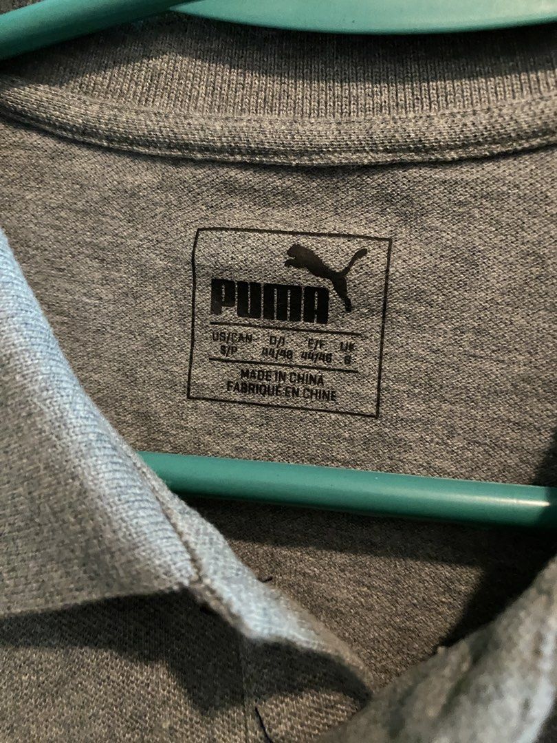 Puma Ferrari Grey Polo Shirt (Category: Tshirts & Polo Shirts ) located in Manila. Submitted by humbee07 (Listing ID 1445467496, Image 3). Description: - Authentic Grey Puma x Ferrari Polo Shirt - Size: S - Features iconic Ferrari shield logo on chest - Puma logo on sleeve.