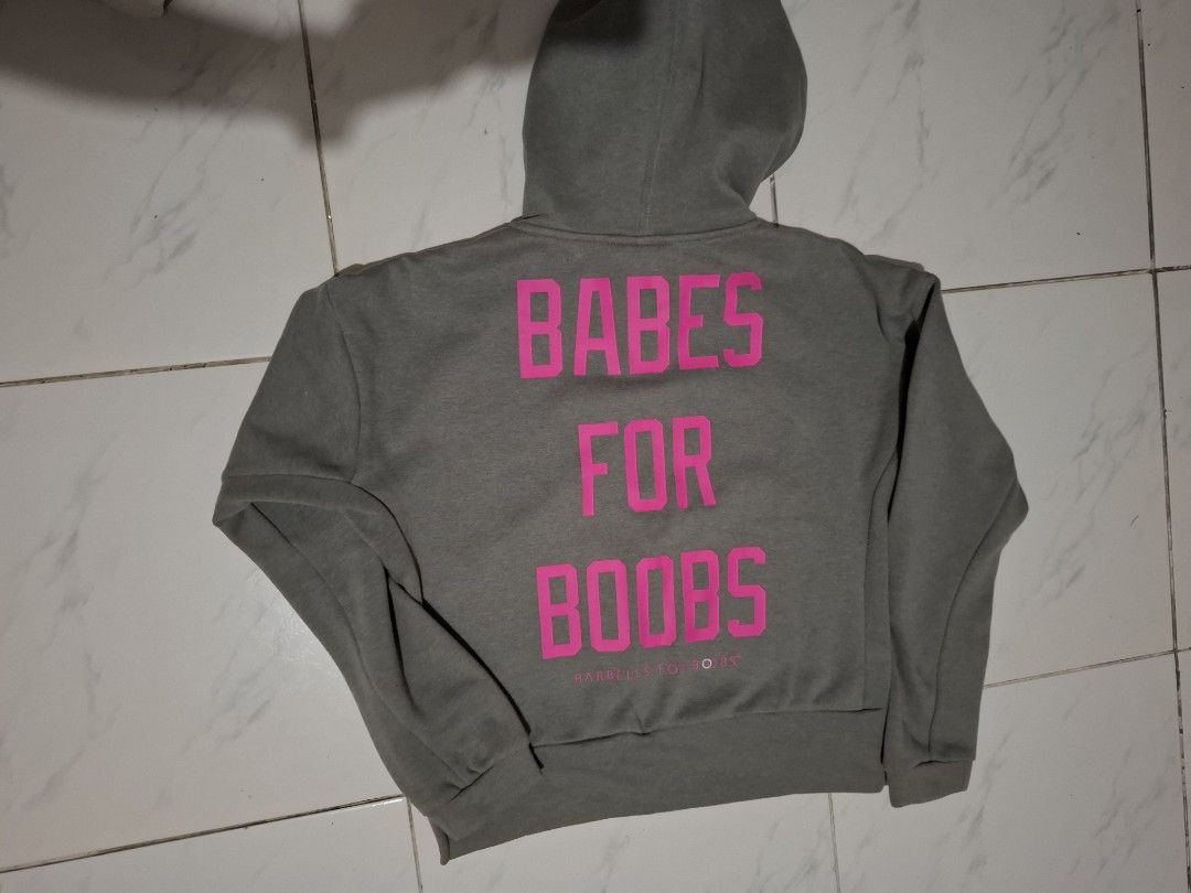 Puma Grey Hoodie Boxy Type (Category: Coats, Jackets and Outerwear) located in Bulacan. Submitted by firsthand_personalstuff (Listing ID 1445474752, Image 2). Description: Steal Price!!! Authentic Puma hoodie Boxy type - Features a pink Puma logo on the front - Zip-up front with a hood - Pink trim inside the hood and along the bottom hem rfs: decluttering, wfh set up, not using it *All items are from brandnew condition *discolouration due to came