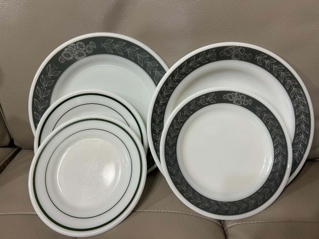 PYREX Dinnerware Set - Blue & Green Trim (Category: Dinnerware & Cutlery) located in Cebu City. Submitted by mjuntilla (Listing ID 1445428983, Image 3). Description: - Complete pytex dinnerware set - Includes plates and bowls with blue and green trim - Features cups and saucers with a green leaf pattern - Some pieces have a simple blue stripe design - Versatile for everyday meals or special gatherings - Perfect for mixing and matching styles.
