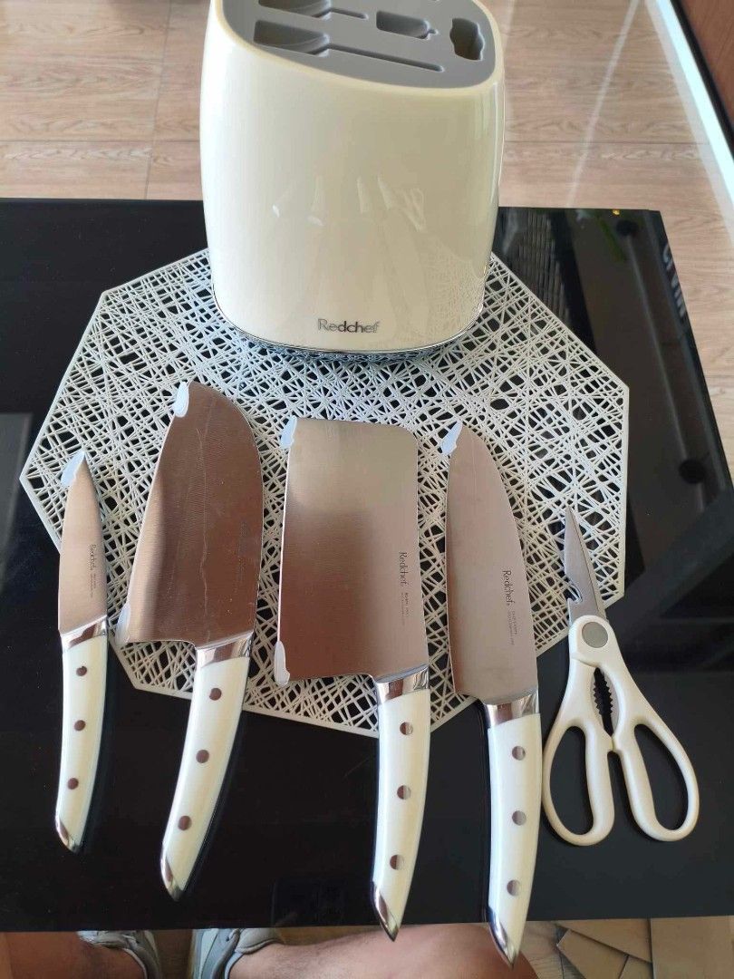 Redchef Knife Set with Block and Scissors (Category: Knives & Chopping Boards) located in Manila. Submitted by cj_1234567 (Listing ID 1445425710, Image 2). Description: - Complete Redchef knife set - Includes knife block and kitchen scissors - Blades made from premium martensitic steel with a golden edge - Ergonomic handles for a comfortable grip - One-piece cast blade construction - Ideal for everyday kitchen use.