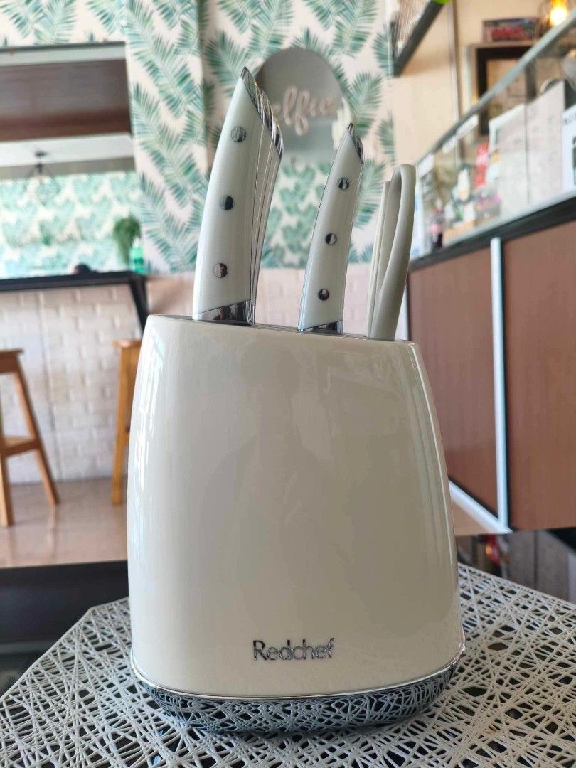 Redchef Knife Set with Block and Scissors (Category: Knives & Chopping Boards) located in Manila. Submitted by cj_1234567 (Listing ID 1445425710, Image 1). Description: - Complete Redchef knife set - Includes knife block and kitchen scissors - Blades made from premium martensitic steel with a golden edge - Ergonomic handles for a comfortable grip - One-piece cast blade construction - Ideal for everyday kitchen use.