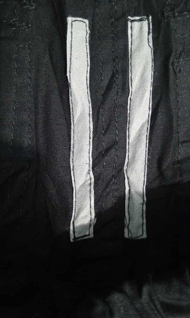 RICK OWENS DRKSHDW (Category: Joggers) located in Manila. Submitted by good2thrift (Listing ID 1445440890, Image 3). Description: RICK OWENS DRKSHDW BLACK PUSHER PANTS SIZE LENGTH 40.5 WIDTH 36 STRECHABLE LEG 11 - These pusher pants are floor length with a wide leg and a slightly dropped crotch. They have an elasticized waistband with drawstring, side front jet pockets and square back pockets with flaps and topstitching. They feature visible snap