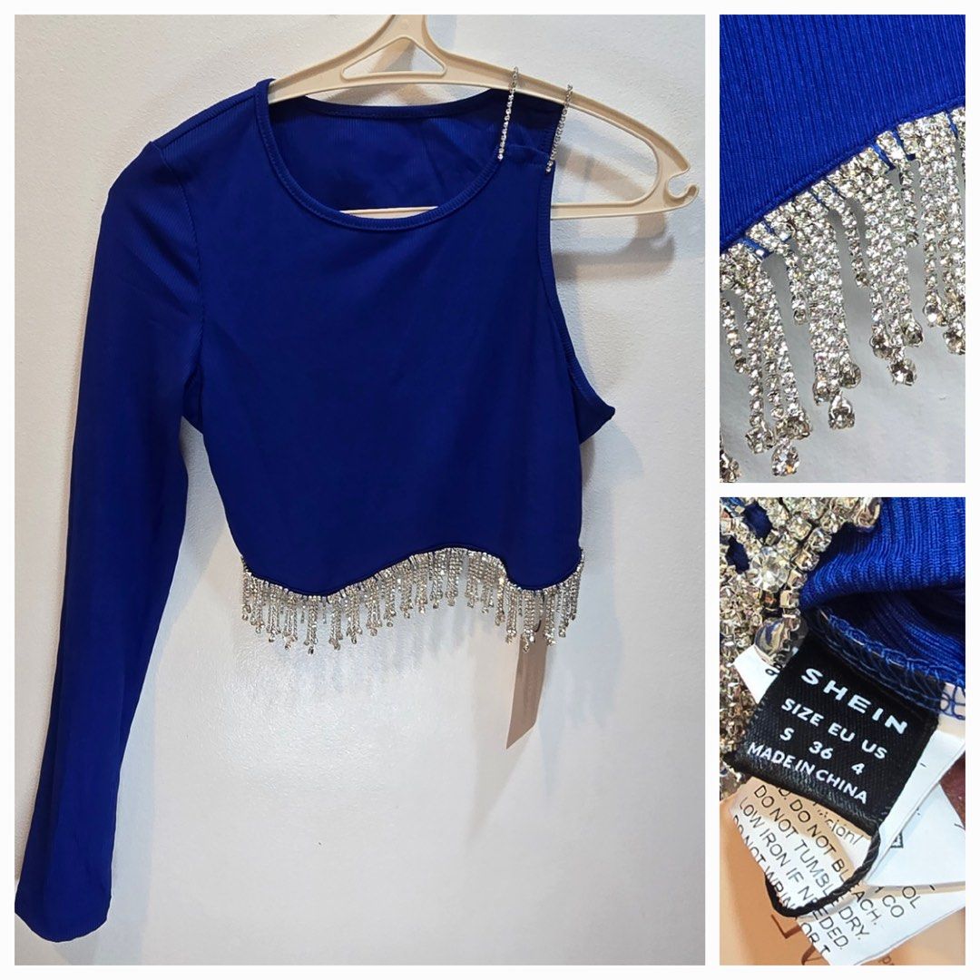 Royal blue top with crystal fringe (Category: Blouses) located in Mandaluyong City. Submitted by paushhstore (Listing ID 1445598245, Image 2). Description: Just a friendly reminder: 🎗No low baller/no tawad divisoria 🧡For preloved items, always expect signs of use 🔎Once offer is accepted, please send us your name, shipping address and contact number along with your preferred MOP and courier 💶MOP: Gcash, Maya, BDO, Unionbank, BPI 🚚Delivery met