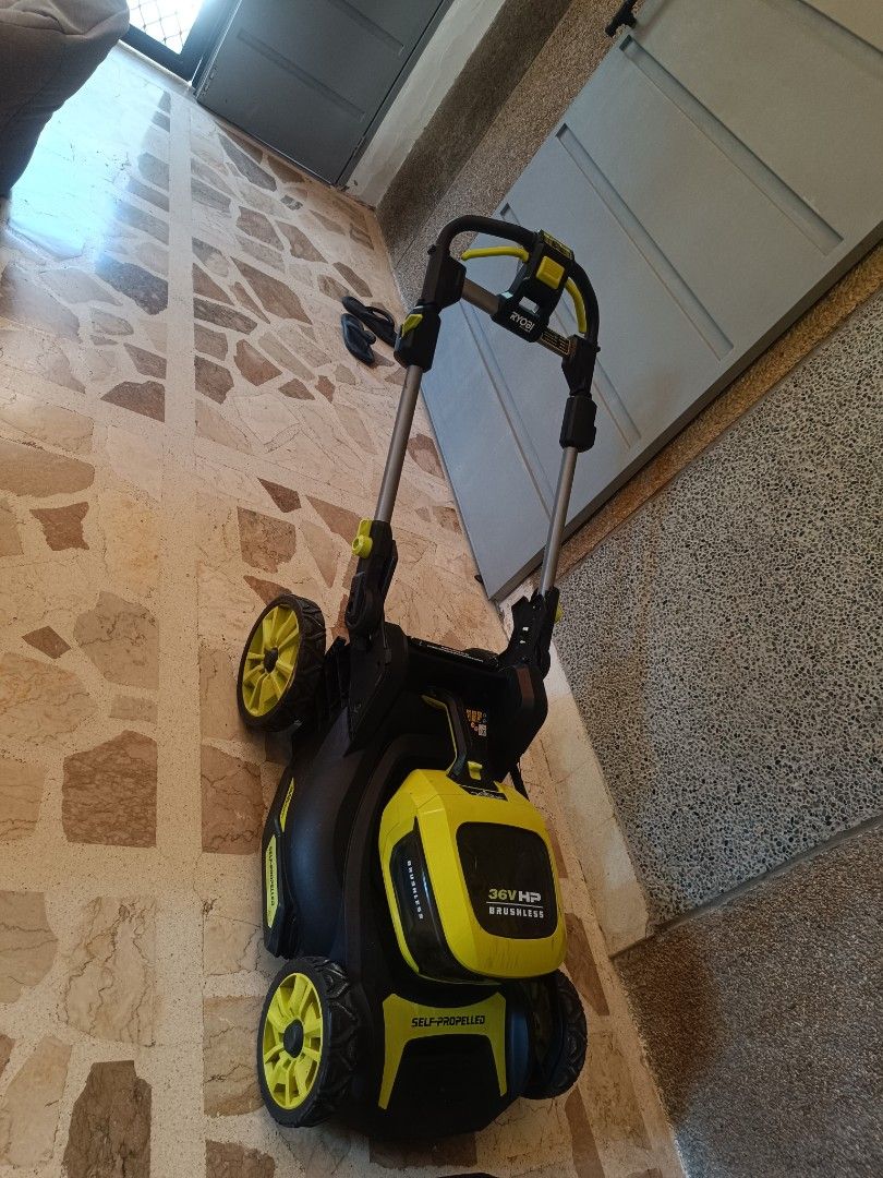 Ryobi 36V Lithium 4Ah Battery Powered Lawn Mower (Category: Construction Tools & Equipment) located in Tarlac. Submitted by ibrahimharb81 (Listing ID 1445540937, Image 3). Description: - Ryobi 36V Lawn Mower - Brushless Motor - Self-Propelled for easy mowing - Includes 36V Lithium 4Ah Battery and Charger - Ideal for small to medium-sized yards - Easy to maneuver and operate - Achieve a sharp, well-maintained lawn location tarlac city for pick up 