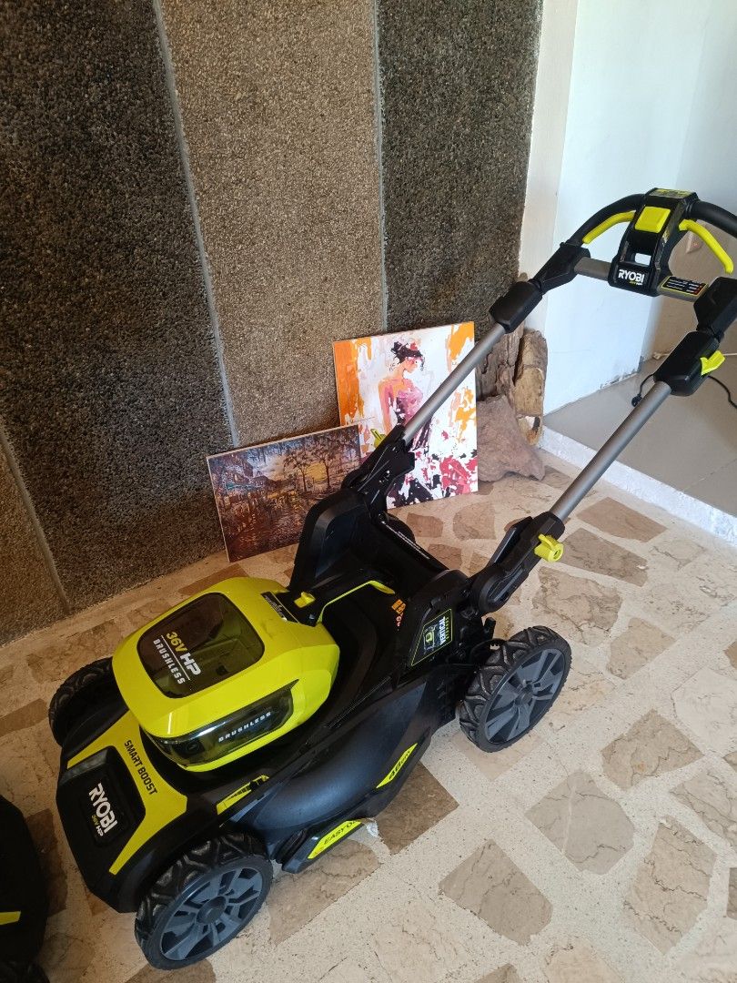 Ryobi 36V Lithium 4Ah Battery Powered Lawn Mower (Category: Construction Tools & Equipment) located in Tarlac. Submitted by ibrahimharb81 (Listing ID 1445540937, Image 1). Description: - Ryobi 36V Lawn Mower - Brushless Motor - Self-Propelled for easy mowing - Includes 36V Lithium 4Ah Battery and Charger - Ideal for small to medium-sized yards - Easy to maneuver and operate - Achieve a sharp, well-maintained lawn location tarlac city for pick up 