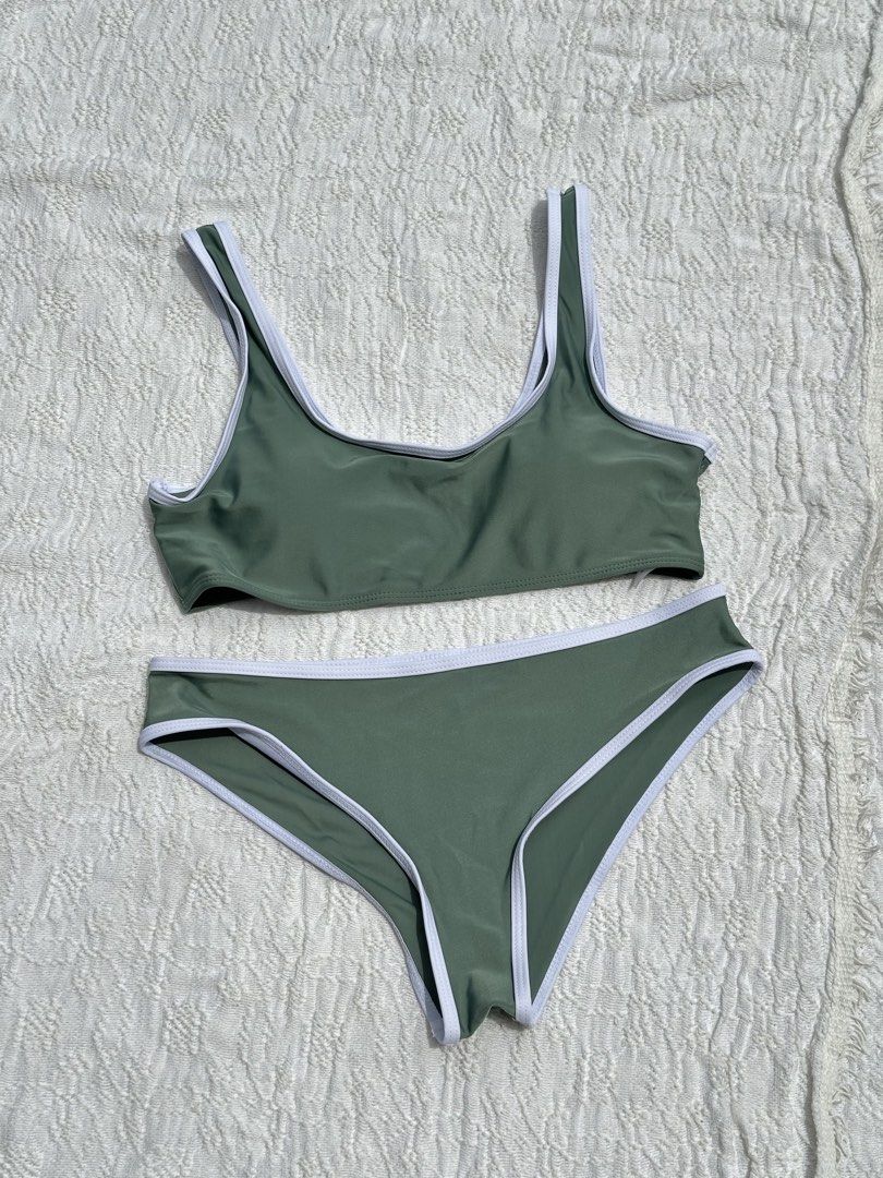 Sage Green Sporty Bikini Set (Category: Bikinis & Swimsuits) located in Quezon City. Submitted by angelicaesthetics (Listing ID 1445561602, Image 1). Description: - Large on tag - Two-piece bikini set - Sports bra top - High-cut bottom - RFS: too big on me, not able to use it 📍QC-based.