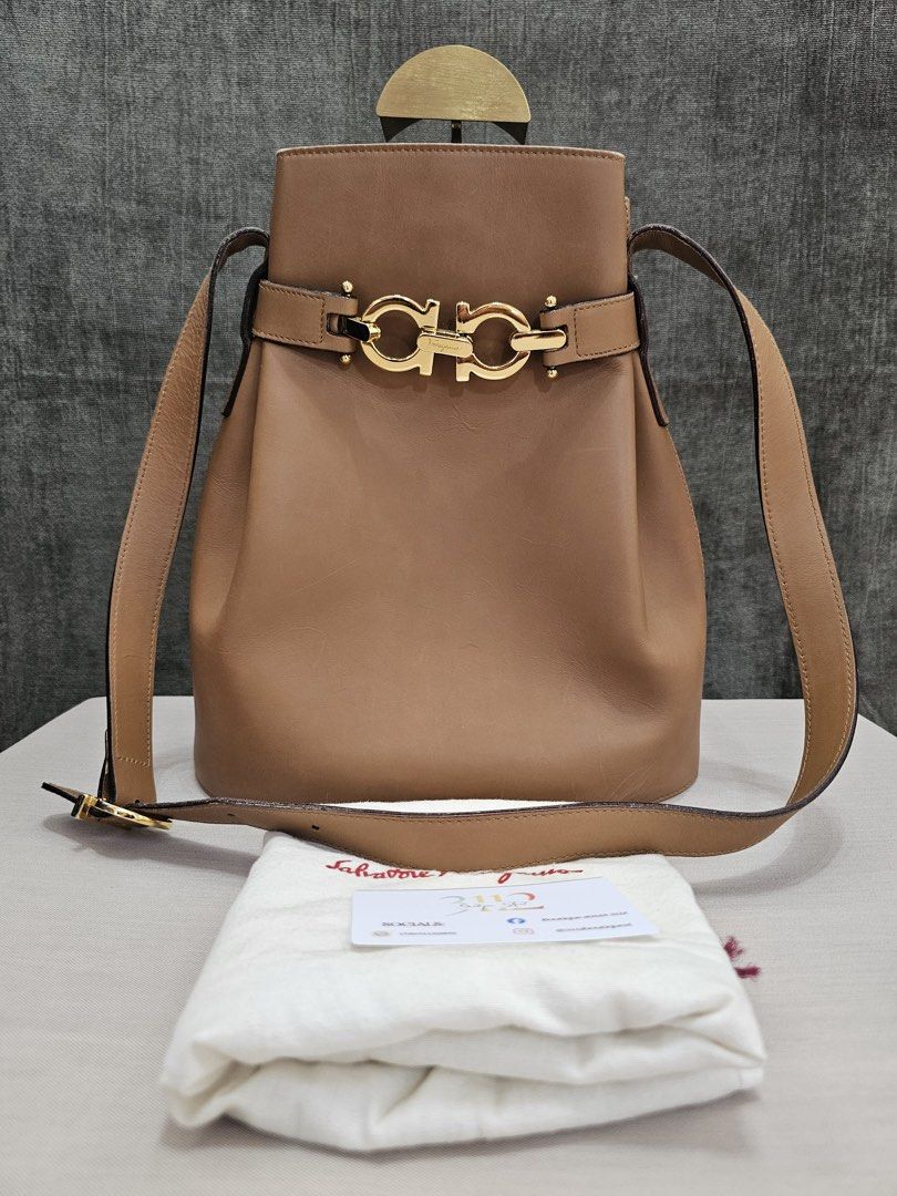 Salvatore Ferragamo Bucket Bag (Category: Luxury Bags & Wallets) located in Bulacan. Submitted by boutiquest3112 (Listing ID 1445522957, Image 2). Description: 💯 Authentic Very Good Condition with original dust bag Flaw: loose stitching on the bottom.