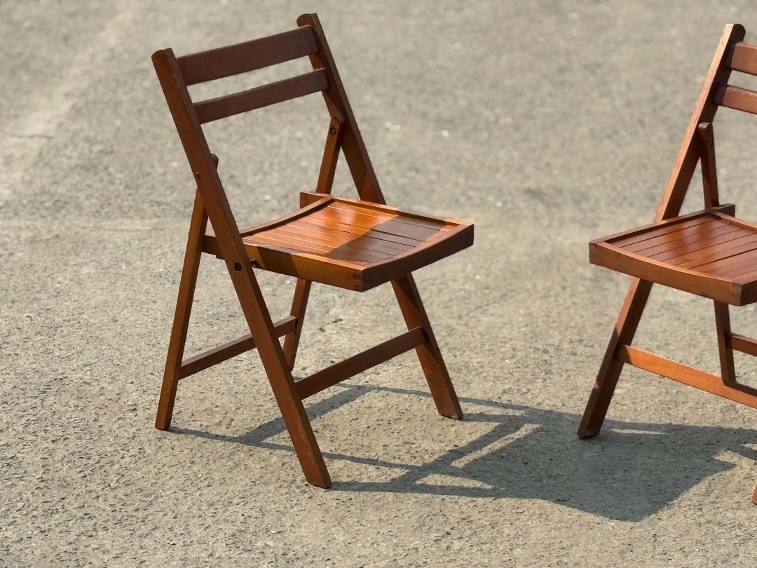 Set of 2 Wooden Folding Chairs (Category: Chairs) located in Valenzuela. Submitted by upcycle_things (Listing ID 1445462821, Image 3). Description: - Set of 2 wooden folding chairs - Features a nice wood finish - Slatted seat and backrest for comfort - Foldable design for easy storage and transport - Perfect for extra seating.