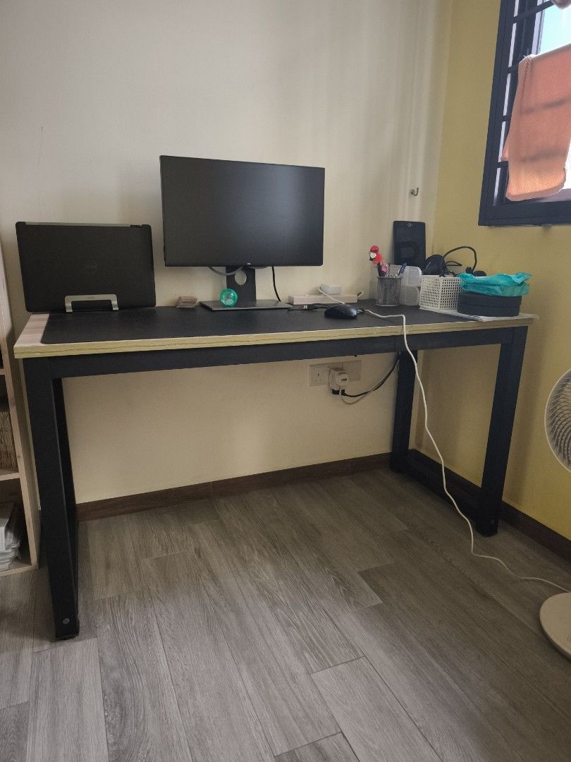 Computer table (Category: Tables & Sets) located in Singapore. Submitted by garfi31d (Listing ID 1445540868, Image 1). Description: - Sturdy desk with black metal frame - Light wood-effect tabletop - Ample legroom for comfortable use - Smooth, easy-to-clean surface - About 1.4m by 0.7m Self collect only..