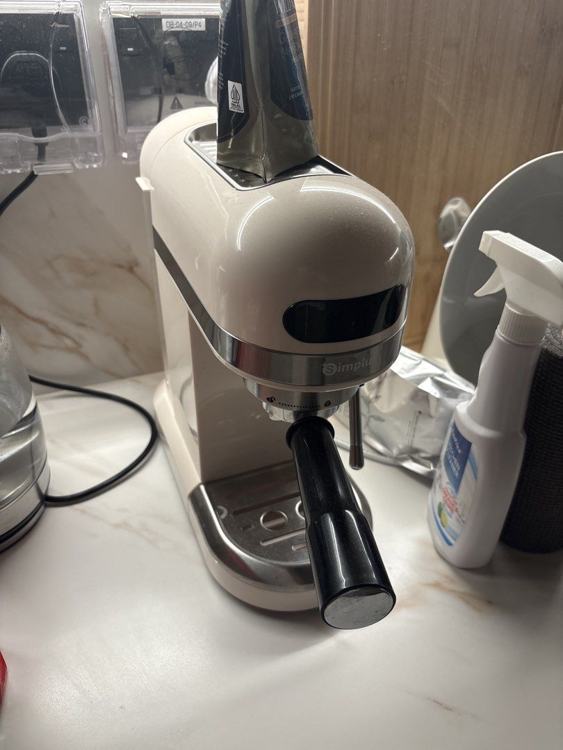 SImplus coffee machine (Category: Coffee Machines & Makers) located in Singapore. Submitted by 175213423569977 (Listing ID 1445482727, Image 1). Description: - Includes portafilter - Perfect for homemade coffee drinks - User-friendly operation and cleaning - Ideal for coffee enthusiasts - Selling due to upgrade.