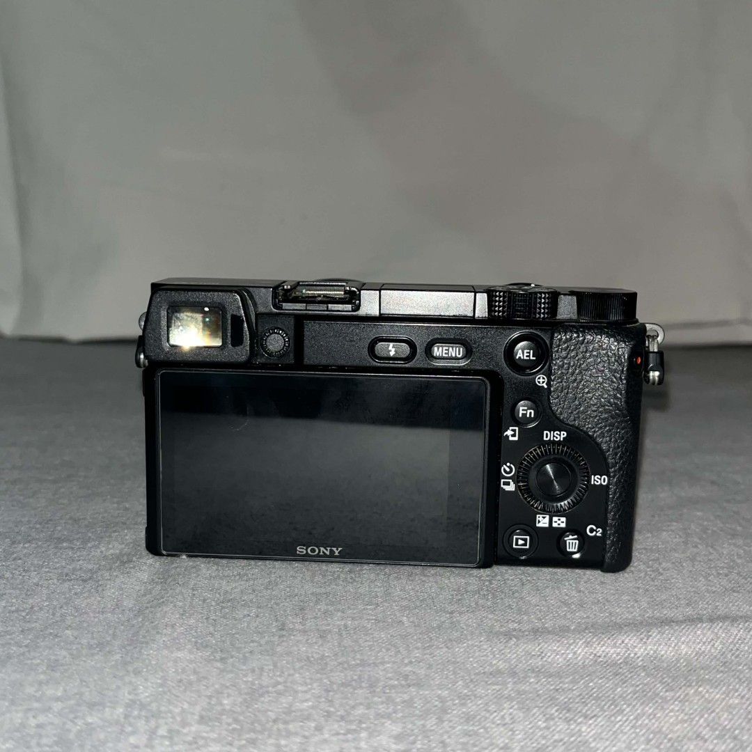 Sony Alpha a6100 Mirrorless Camera (Category: Cameras) located in Dasmarinas. Submitted by kei05 (Listing ID 1445548315, Image 2). Description: 1. Sony A6100 Mirrorless Camera (Shutter Count - 8444) with Kit Lens 16-50mm - PHP 32,000 Inclusions (Sony Cam): - 1 Camera Bag - 1 Extra Battery for Camera - 1 16GB MicroSD - 1 Camera Charger Details: - Low Shutter Count (8444) - Sensor: 24.2 MP APS-C Exmor CMOS sensor - Autofocus: 425 phase-detection an