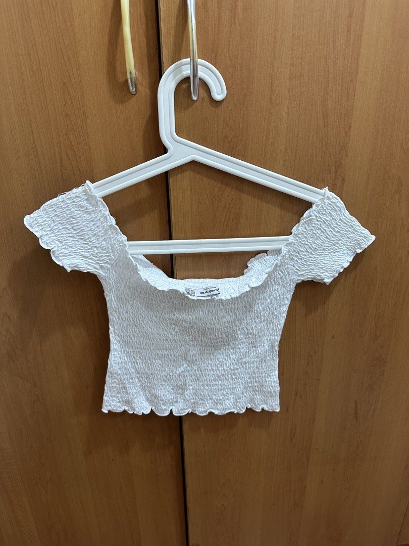 Stradivarius White Smocked Off-Shoulder Crop Top (Category: Others Tops) located in San Juan City. Submitted by nanahachis (Listing ID 1445515409, Image 2). Description: previous owner’s measurements ♡ bust: 34 in waist: 27 in hip: 33 in feel free to send a message for more details / photos location: san juan city, metro manila mop: gcash mod: jnt or sdd shipping usually every wed & fri or when i have free time ! will let you know in advance ^___