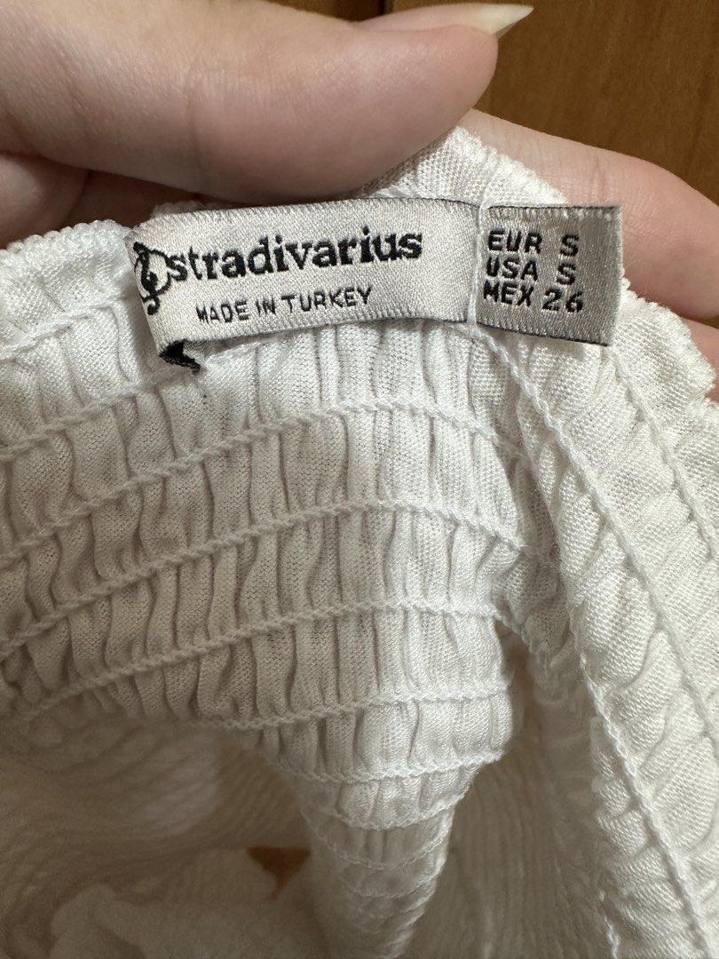 Stradivarius White Smocked Off-Shoulder Crop Top (Category: Others Tops) located in San Juan City. Submitted by nanahachis (Listing ID 1445515409, Image 3). Description: previous owner’s measurements ♡ bust: 34 in waist: 27 in hip: 33 in feel free to send a message for more details / photos location: san juan city, metro manila mop: gcash mod: jnt or sdd shipping usually every wed & fri or when i have free time ! will let you know in advance ^___