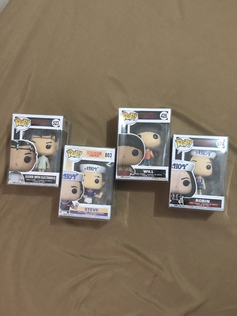 Stranger Things Funko Pop Dupes Bundle (Category: Designer & Blind Box Toys) located in Bacoor. Submitted by enkarteu (Listing ID 1445473543, Image 2). Description: - Funko Pop dupes (NOT authentic) - have acrylic cases - their orig boxes po have crease. i put tapes on them nalang, but not noticeable since may case :) - perfect for display 📍bacoor mop: gcash mod: lalamove // ggx.