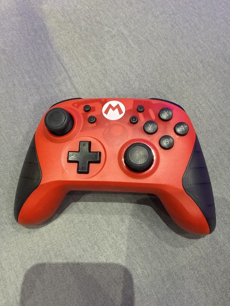 Super Mario Switch Controller (Category: Controllers) located in Singapore. Submitted by jaggerjacks (Listing ID 1445579985, Image 1). Description: Super Mario Nintendo Switch Controller ✅ Like new condition ✅ Seldom used ✅ 100% working condition ✅ Well maintained Selling as no longer in use. Comfortable grip and great for multiplayer gaming sessions. Test on the spot welcome. Self collect Serangoon at my house only or courier +$5. I do not meet 