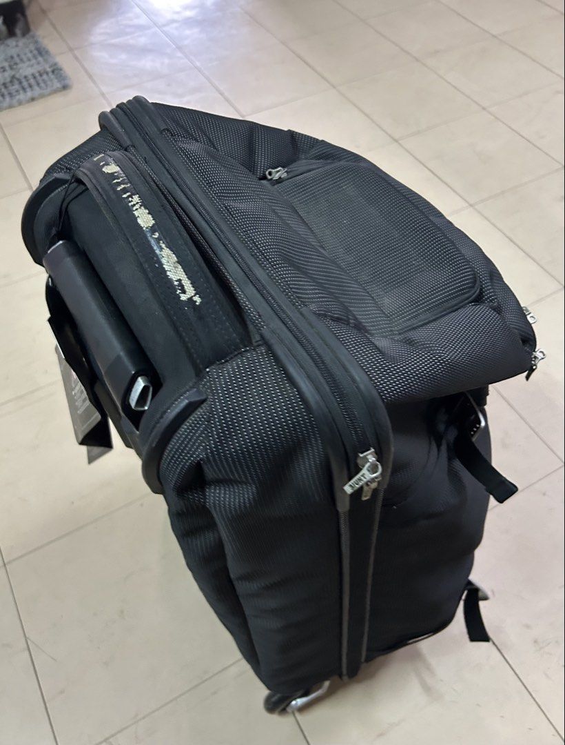 Thule Black Rolling Luggage Bag (Category: Luggage) located in Quezon City. Submitted by rottiemom (Listing ID 1445424509, Image 2). Description: - Black Thule rolling luggage - Retractable handle and wheels for easy transport - Multiple compartments for organization - Shows some wear on handle - Still very functional for travel Bought for 17k, bought then stored, never pa nagamit. Handle nagbakbak na pero usable padin Zipper natanggal na ung blu