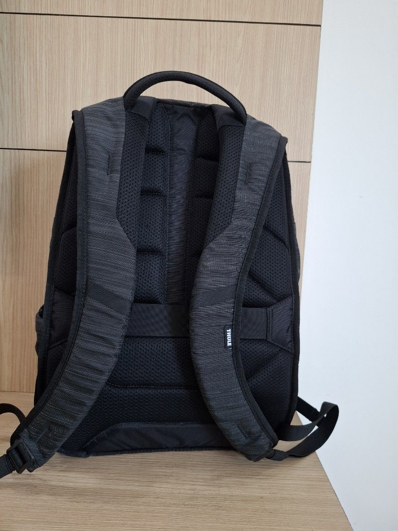 THULE Construct Backpack 24L (Category: Backpacks) located in Singapore. Submitted by perculiars (Listing ID 1445453063, Image 3). Description: - Thule Construct Backpack - 24L Capacity - Color: Dark Grey with subtle stripe pattern - Multiple internal compartments for organization - Padded back panel & shoulder straps for comfort - Perfect for daily commutes & travel ** CALL 9237 1977 NOW!!.