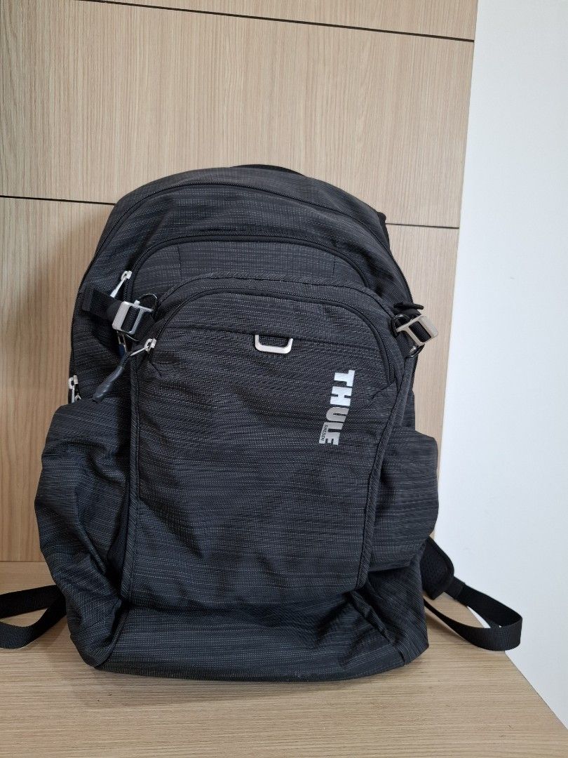 THULE Construct Backpack 24L (Category: Backpacks) located in Singapore. Submitted by perculiars (Listing ID 1445453063, Image 1). Description: - Thule Construct Backpack - 24L Capacity - Color: Dark Grey with subtle stripe pattern - Multiple internal compartments for organization - Padded back panel & shoulder straps for comfort - Perfect for daily commutes & travel ** CALL 9237 1977 NOW!!.