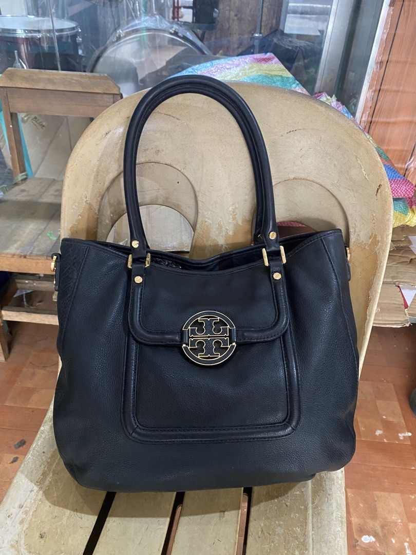 Tory Burch handbag Shoulder Black Leather Bag (Category: Luxury Bags & Wallets) located in Legazpi City. Submitted by folksfave (Listing ID 1445428487, Image 1). Description: Rank AB Excellent condition Working zip Hardware and leather materials are in good Clean inner No rubs Presentable.