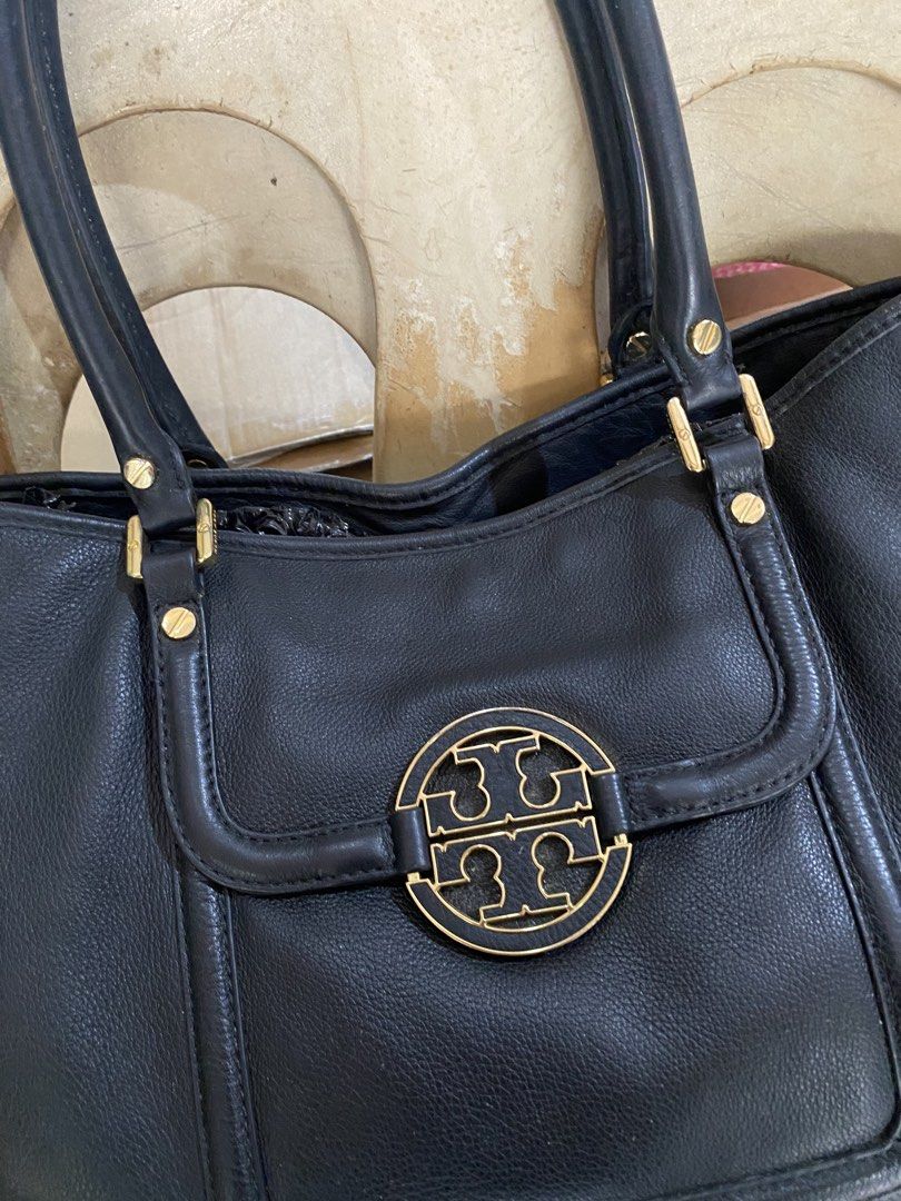 Tory Burch handbag Shoulder Black Leather Bag (Category: Luxury Bags & Wallets) located in Legazpi City. Submitted by folksfave (Listing ID 1445428487, Image 2). Description: Rank AB Excellent condition Working zip Hardware and leather materials are in good Clean inner No rubs Presentable.