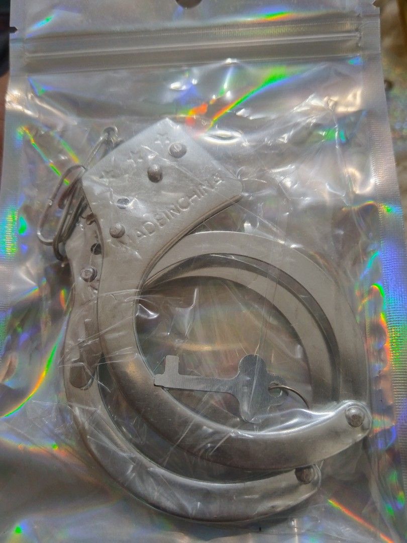 Toy Handcuffs / Prop (Category: Action & Battle Toys) located in Manila. Submitted by winslet99 (Listing ID 1445482304, Image 1). Description: Toy Handcuffs / Prop ✅ With lock and 2 keys ✅ Smooth mechanism ✅ Perfect for costume, role‑play, parties, or giveaways ✅ For fun use only.
