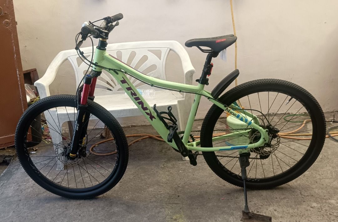 Trinx N106 Mountain Bike (Category: Bicycles) located in Caloocan City. Submitted by anthonyhearts24 (Listing ID 1445429474, Image 3). Description: Please read description first. will not reply to questions that is already in here. thank you. Trinx N106 Mountain Bike Alloy Frame 6061 Mountain Peak air fork Shimano Hydraulic Brake Shinmano 9 Speed cogs Shimano Cues RD KMC 9 Speed chain Cst tires Pickup only Pickup location: Cal-asia direct distrib