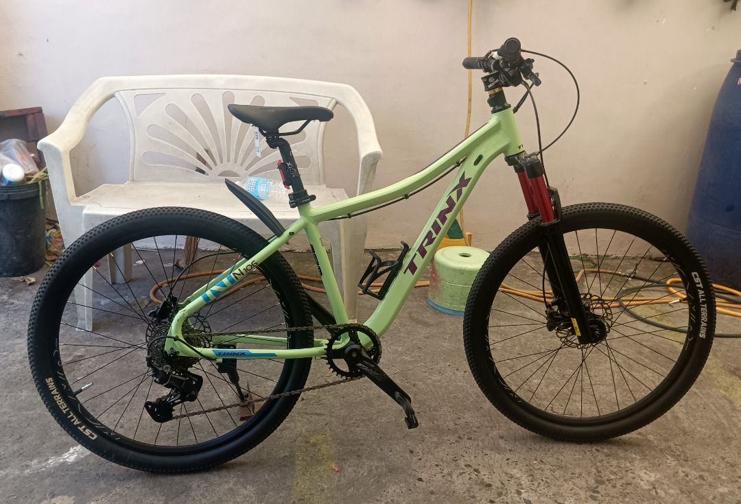 Trinx N106 Mountain Bike (Category: Bicycles) located in Caloocan City. Submitted by anthonyhearts24 (Listing ID 1445429474, Image 2). Description: Please read description first. will not reply to questions that is already in here. thank you. Trinx N106 Mountain Bike Alloy Frame 6061 Mountain Peak air fork Shimano Hydraulic Brake Shinmano 9 Speed cogs Shimano Cues RD KMC 9 Speed chain Cst tires Pickup only Pickup location: Cal-asia direct distrib