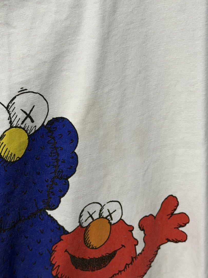 Uniqlo Kaws T shirt (Category: Tshirts & Polo Shirts ) located in Quezon City. Submitted by luxitemsph_ (Listing ID 1445564531, Image 2). Description: with stain .