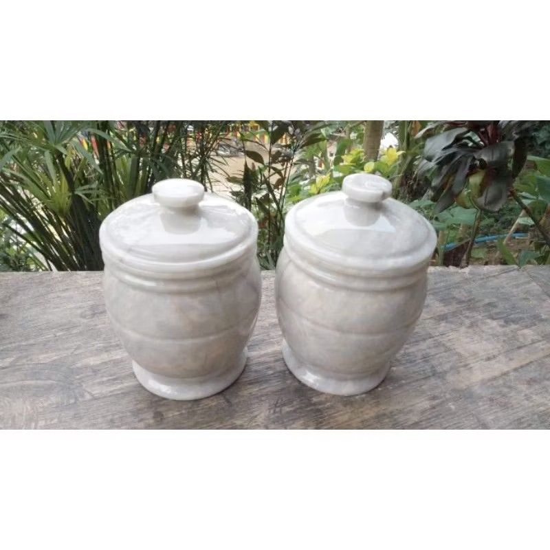 Urn 4*6 (gray, white, century) (Category: Food Organization & Storage) located in Romblon. Submitted by supergm42 (Listing ID 1445459746, Image 1). Description: - Set of 2 white marble jars - Comes with matching lids - Subtle textured pattern on the body - Ideal for storing kitchen essentials (e.g., spices, tea, coffee) - Perfect as decorative pieces for your home - Great for organizing pantry or countertop.