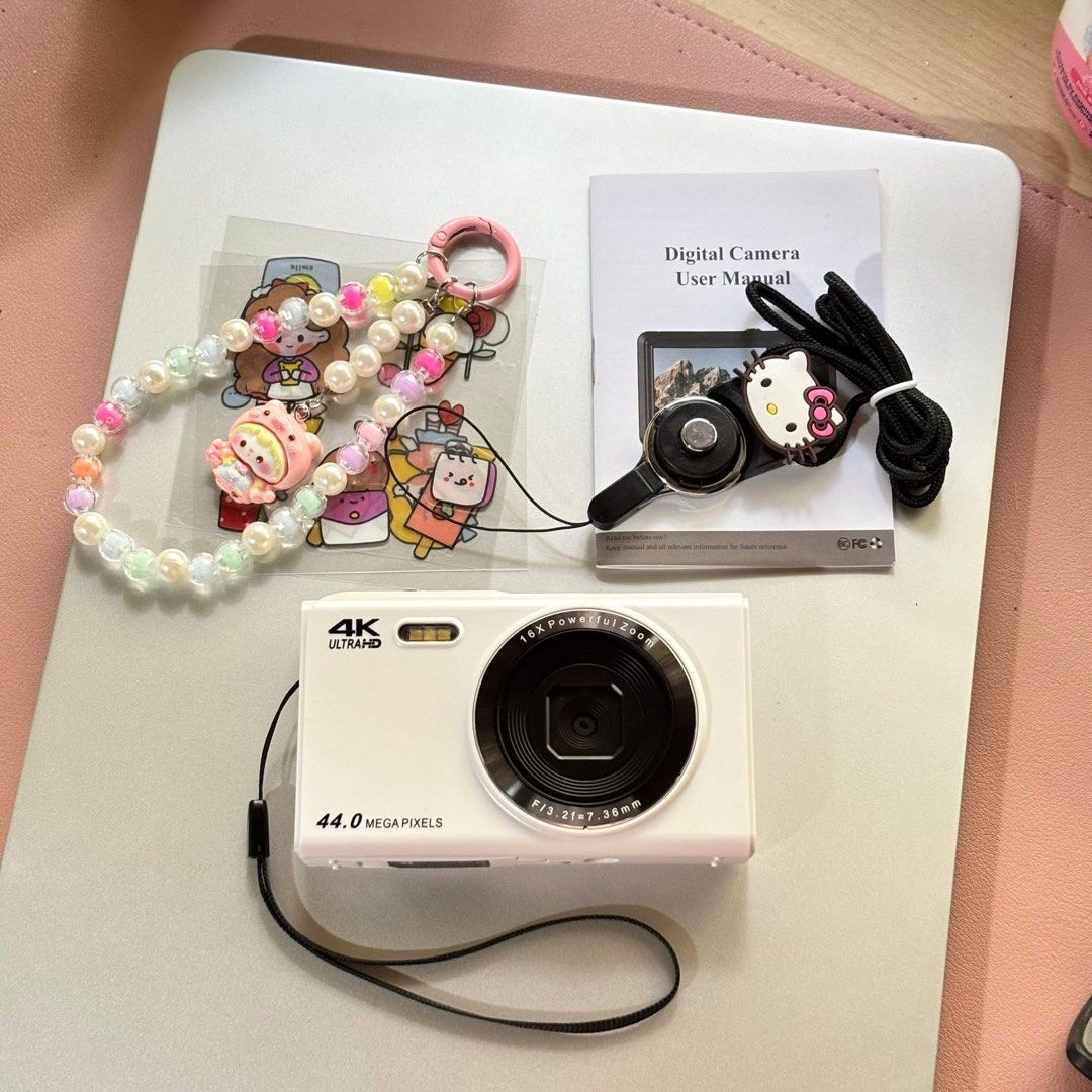 Vetek 2 Digital Camera (Category: Cameras) located in Davao. Submitted by lorry_sells (Listing ID 1445487189, Image 2). Description: 📸✨ Vetek 2 Digital Camera ✨📸 Inclusions: • Box • Camera • 64G Sd Card • Battery • User Manual • Strap with Hello Kitty charm • Beaded Accessory Strap • Stickers 1HORA Type c charger + ₱180 ⚠️ Important: ~ Needed po ang card reader to transfer photos from the SD card, do make sure to purchase one separately if you 