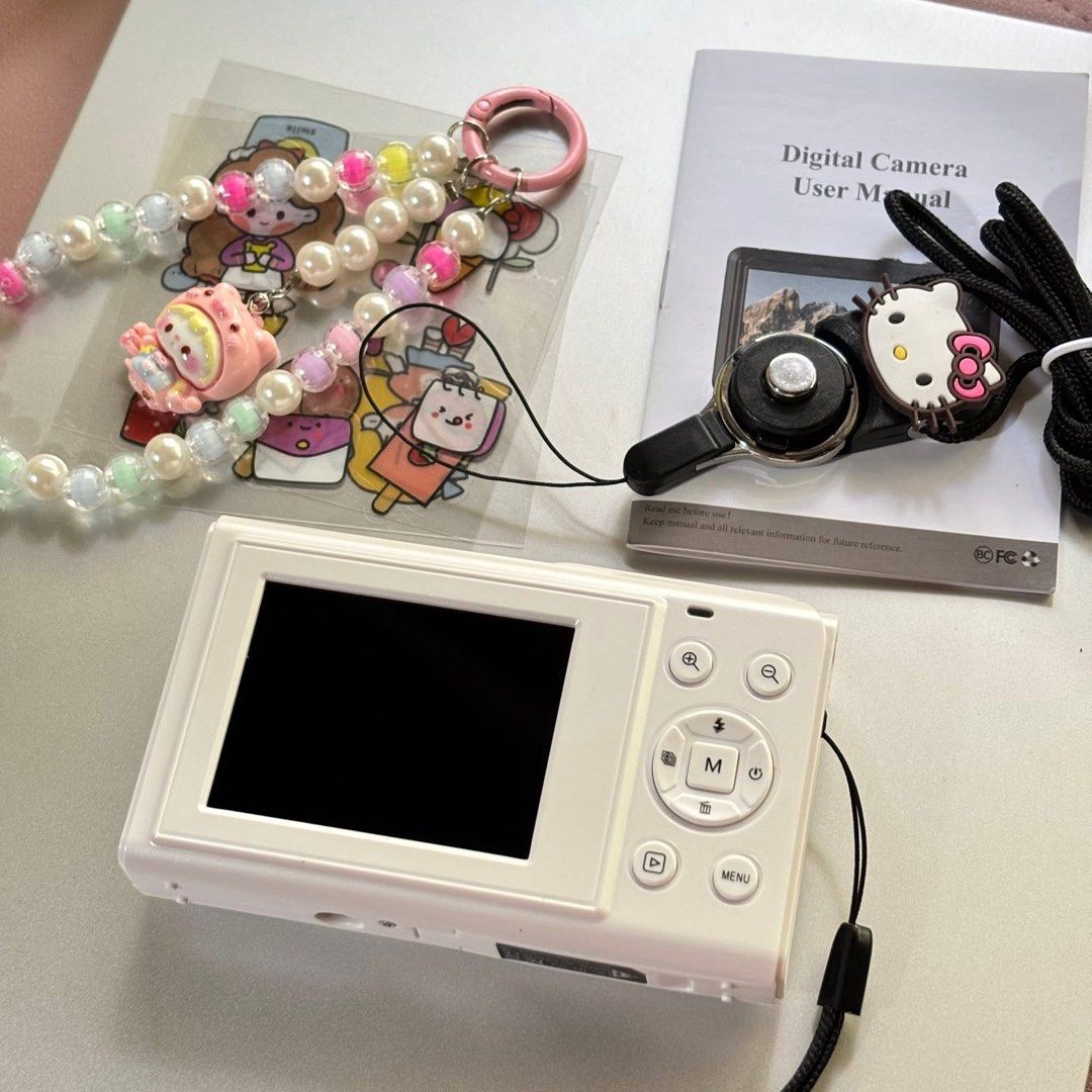 Vetek 2 Digital Camera (Category: Cameras) located in Davao. Submitted by lorry_sells (Listing ID 1445487189, Image 3). Description: 📸✨ Vetek 2 Digital Camera ✨📸 Inclusions: • Box • Camera • 64G Sd Card • Battery • User Manual • Strap with Hello Kitty charm • Beaded Accessory Strap • Stickers 1HORA Type c charger + ₱180 ⚠️ Important: ~ Needed po ang card reader to transfer photos from the SD card, do make sure to purchase one separately if you 