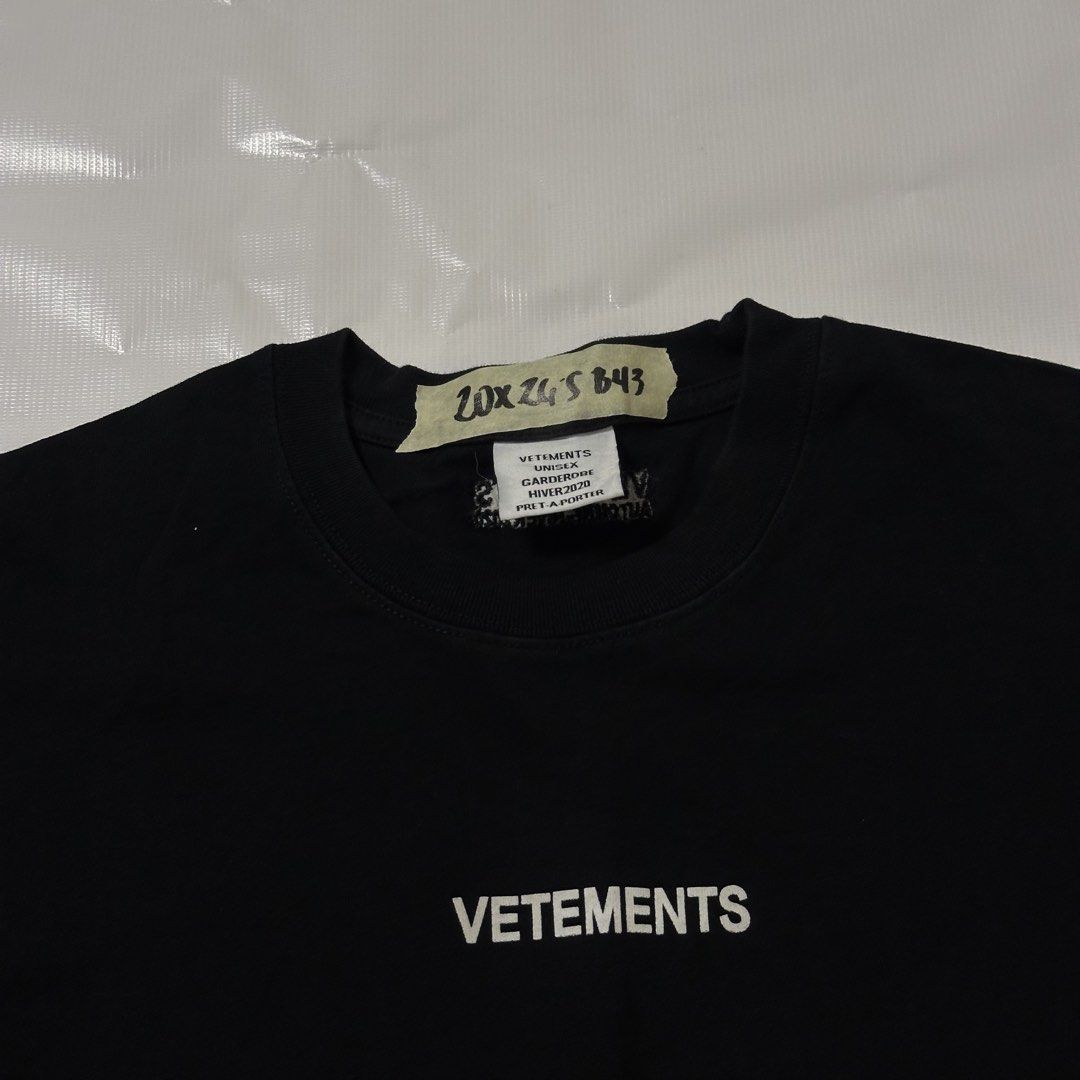 VETEMENTS Black Logo T-Shirt (Category: Tshirts & Polo Shirts ) located in Manila. Submitted by johnedel_james (Listing ID 1445556549, Image 2). Description: - Black VETEMENTS T-shirt - Features iconic VETEMENTS logo on the front - Made from comfortable material for everyday wear - Perfect for casual outfits - Check tags for material and care details.
