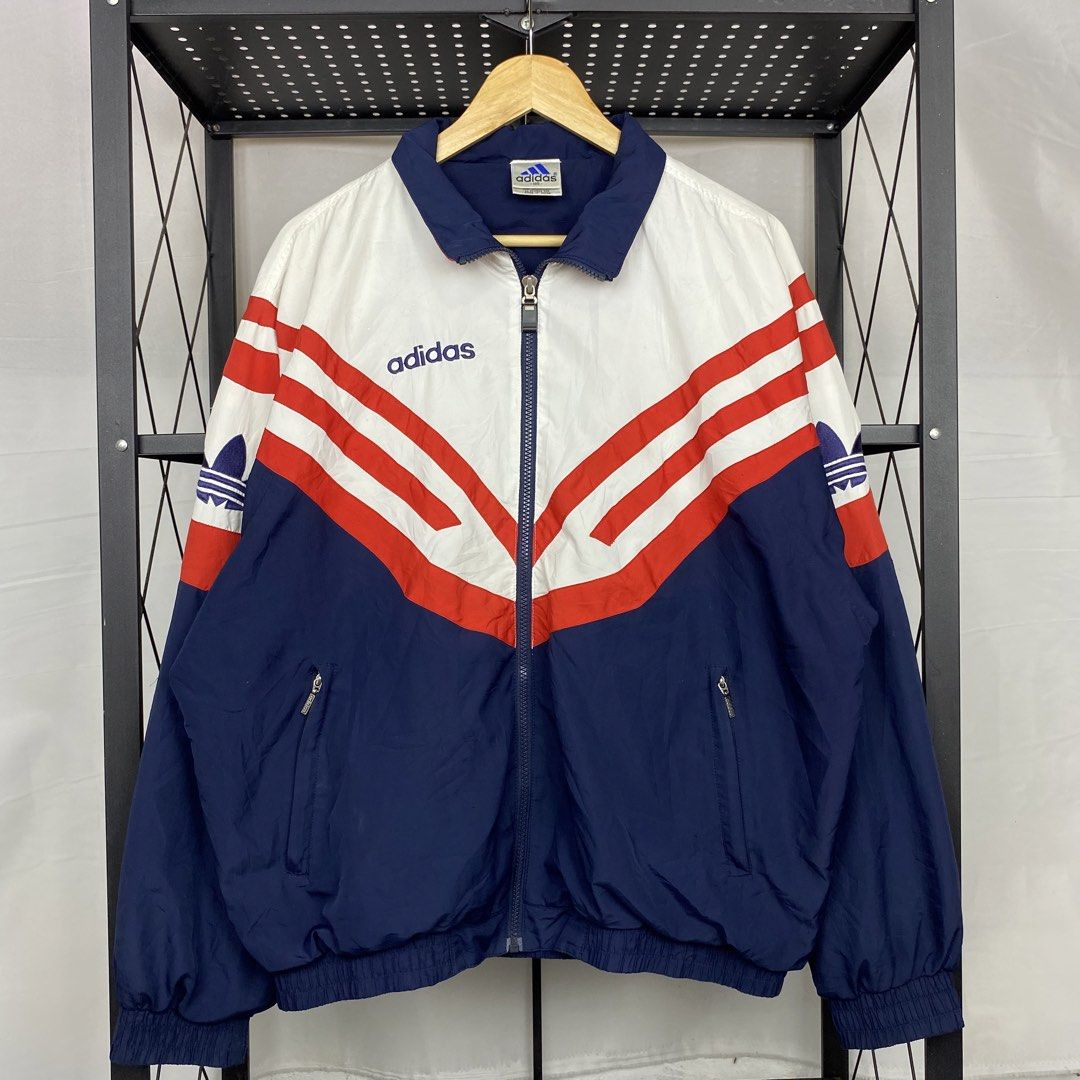 Vintage 90s Adidas Windbreaker Jacket (Category: Coats, Jackets and Outerwear) located in Cebu City. Submitted by cebuvntgvibes (Listing ID 1445544391, Image 1). Description: 27W x 27L (M-XL) . Good as new. Boxy fit. Tight ribbings. Embroidered design. No issue. . Mine ₱1,500+sf.