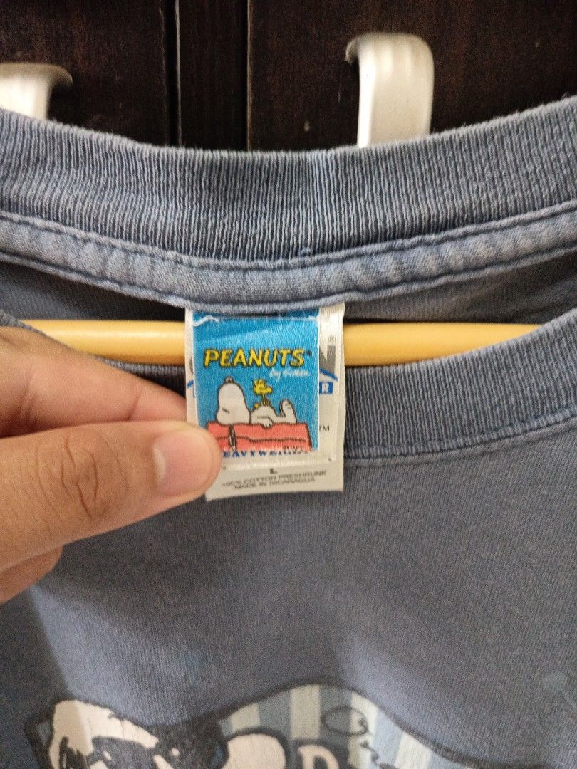 Vintage Snoopy Peanuts Shirt (Category: Tshirts & Polo Shirts ) located in Cavite. Submitted by neiljaymol16885 (Listing ID 1445507550, Image 3). Description: - Blue t-shirt featuring Snoopy in sunglasses with "One Cool Daddy-O" text. - Officially licensed by Peanuts. - Made by Gildan, Ultra Cotton heavyweight fabric. - Size: Large. - Ideal for Snoopy enthusiasts and dads. -Dimes : 21/29.5.