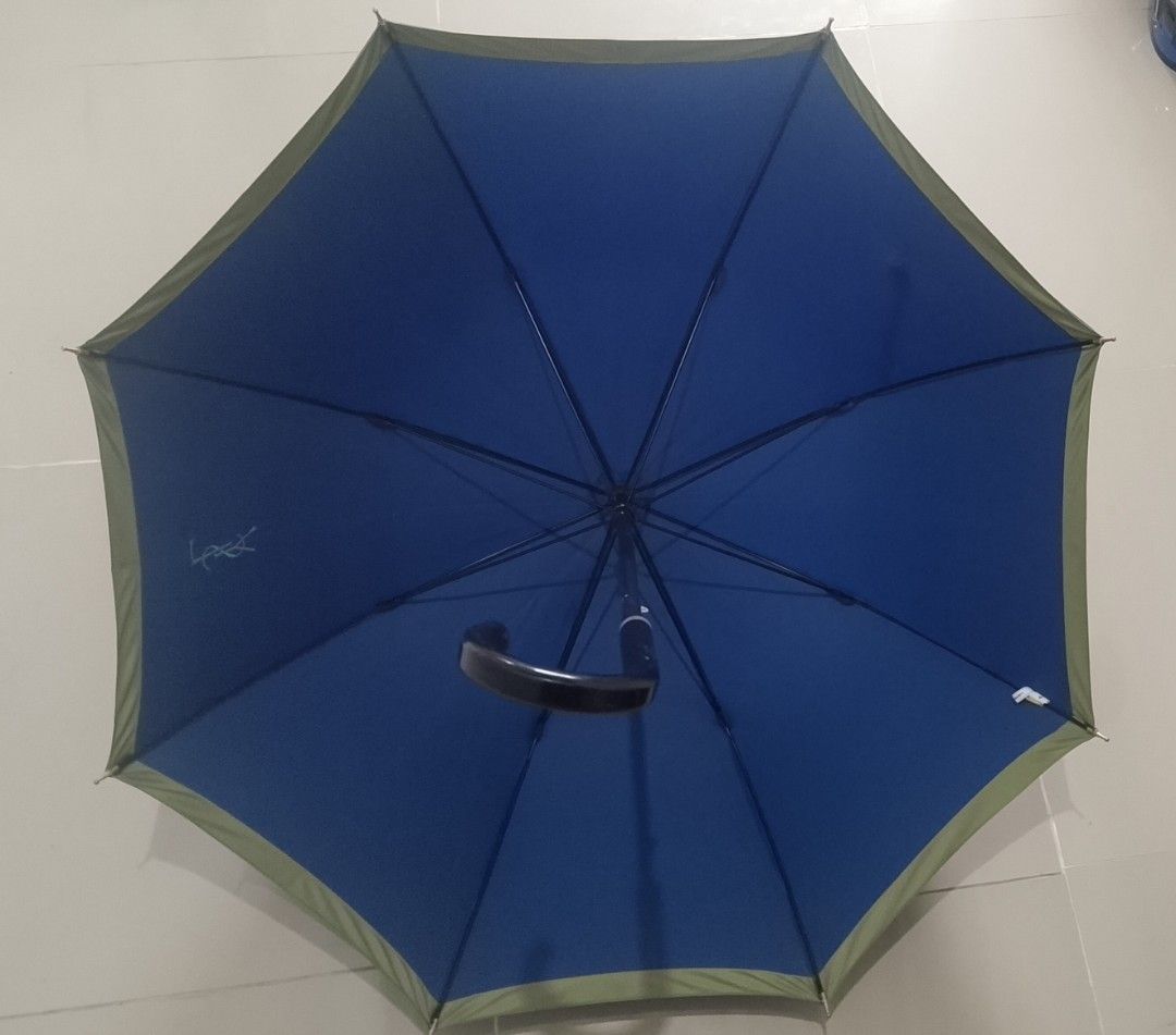 Vintage YSL umbrella (Category: Umbrellas) located in Cavite. Submitted by thrifteditem9_ (Listing ID 1445493427, Image 2). Description: vintage umbrella YSL GREAT CONDITION last 2 picture issue: dot paint minimal scratch sa handle.