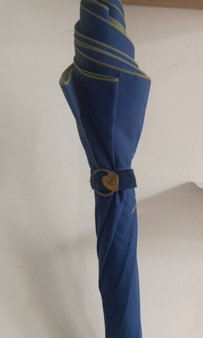 Vintage YSL umbrella (Category: Umbrellas) located in Cavite. Submitted by thrifteditem9_ (Listing ID 1445493427, Image 3). Description: vintage umbrella YSL GREAT CONDITION last 2 picture issue: dot paint minimal scratch sa handle.