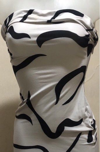 White Strapless Maxi Dress with Black Abstract Print (Category: Dresses) located in Manila. Submitted by tantannnly (Listing ID 1445573549, Image 2). Description: - White strapless maxi dress - Bold all-over black abstract print - Bodycon fit that hugs your curves - Stretchy material for ultimate comfort - Ideal for a night out or special occasion - Modern and chic style.