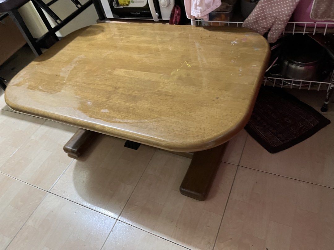 Wooden Coffee Table with Adjustable Height (Category: Tables & Sets) located in Makati City. Submitted by myapplegates (Listing ID 1445497733, Image 2). Description: Japanese center table (Vintage, Adjustable) , solid wood. 41.3” x 27.5”x 21.2” (Adjustable) Height Lowered - 18 inches Raised - 21 inches.