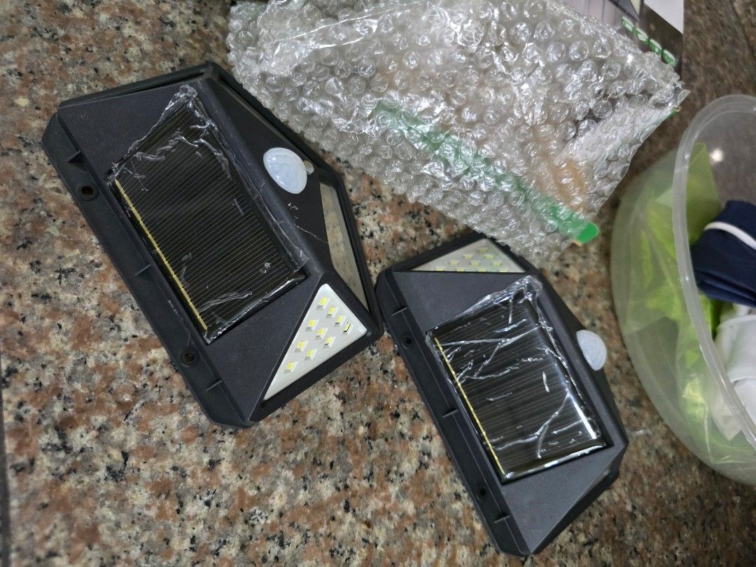 YHEESOLAR 100 LED Solar Wall Light with Motion Sensor (Category: Lighting) located in Caloocan City. Submitted by mluck (Listing ID 1445524295, Image 2). Description: - Set of 2: Get two 100 LED Solar Wall Lights. - Motion Sensor: Automatically detects movement for security and convenience. - Solar Powered: Charges with sunlight, no electricity needed. - Easy Installation: Simply mount and let the sun do the work. - Waterproof: Designed to withst